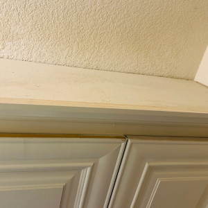 overlooked spots to declutter and clean - top of cabinets