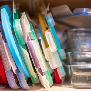 overlooked spots to declutter and clean - Mismatched Tupperware lids