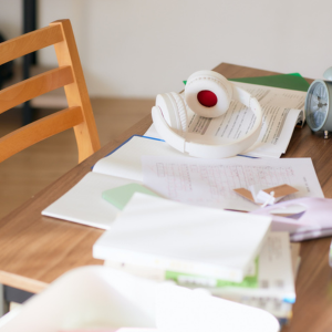 Causes of Cluttering at Home -Papers cluttered on a table